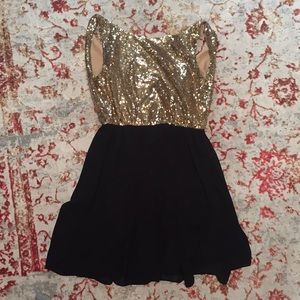 Gold sequined black dress